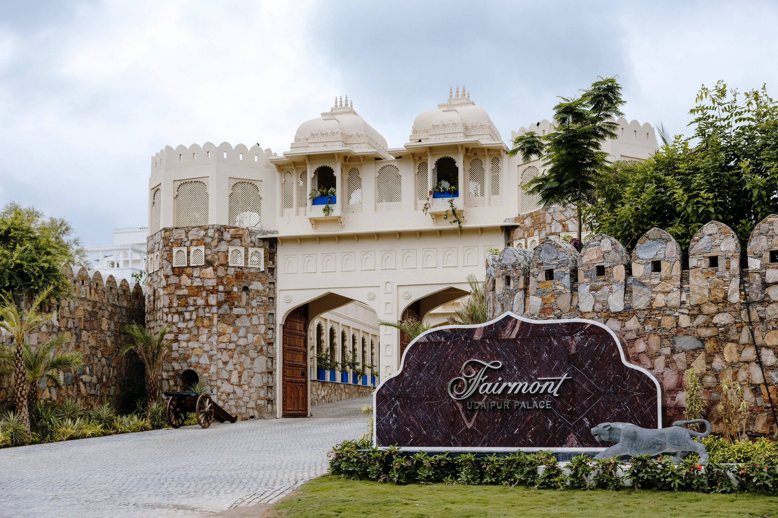 Warm hospitality lounge with seating and patterned flooring